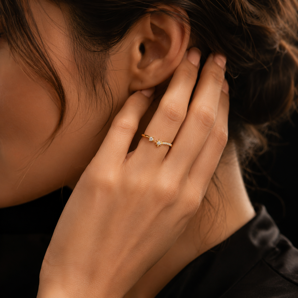 Woman wearing Celestia Star Topaz Ring showcasing elegant adjustable open ring design