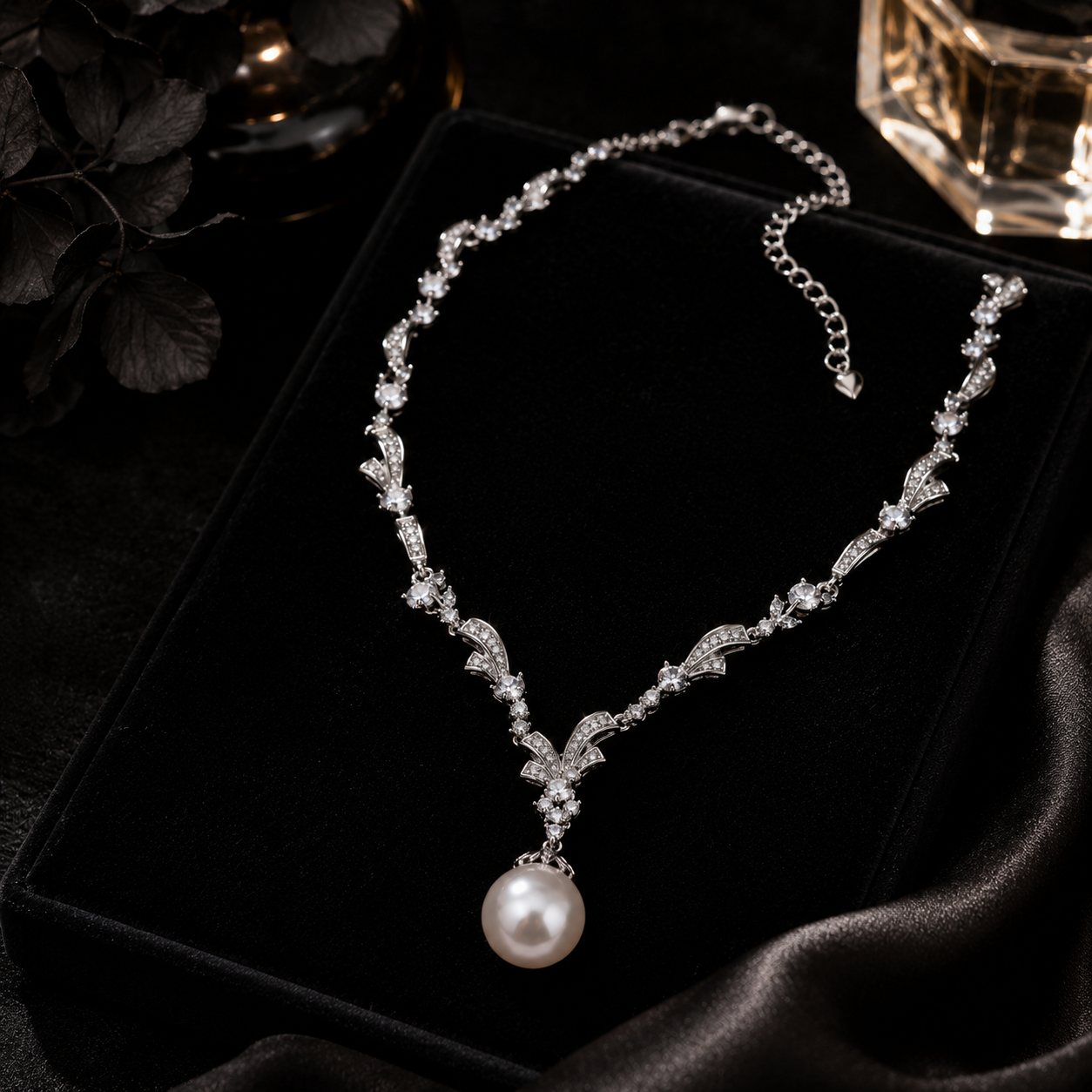 Aurelia Pearl Pendant Necklace displayed with adjustable silver chain and pearl centerpiece