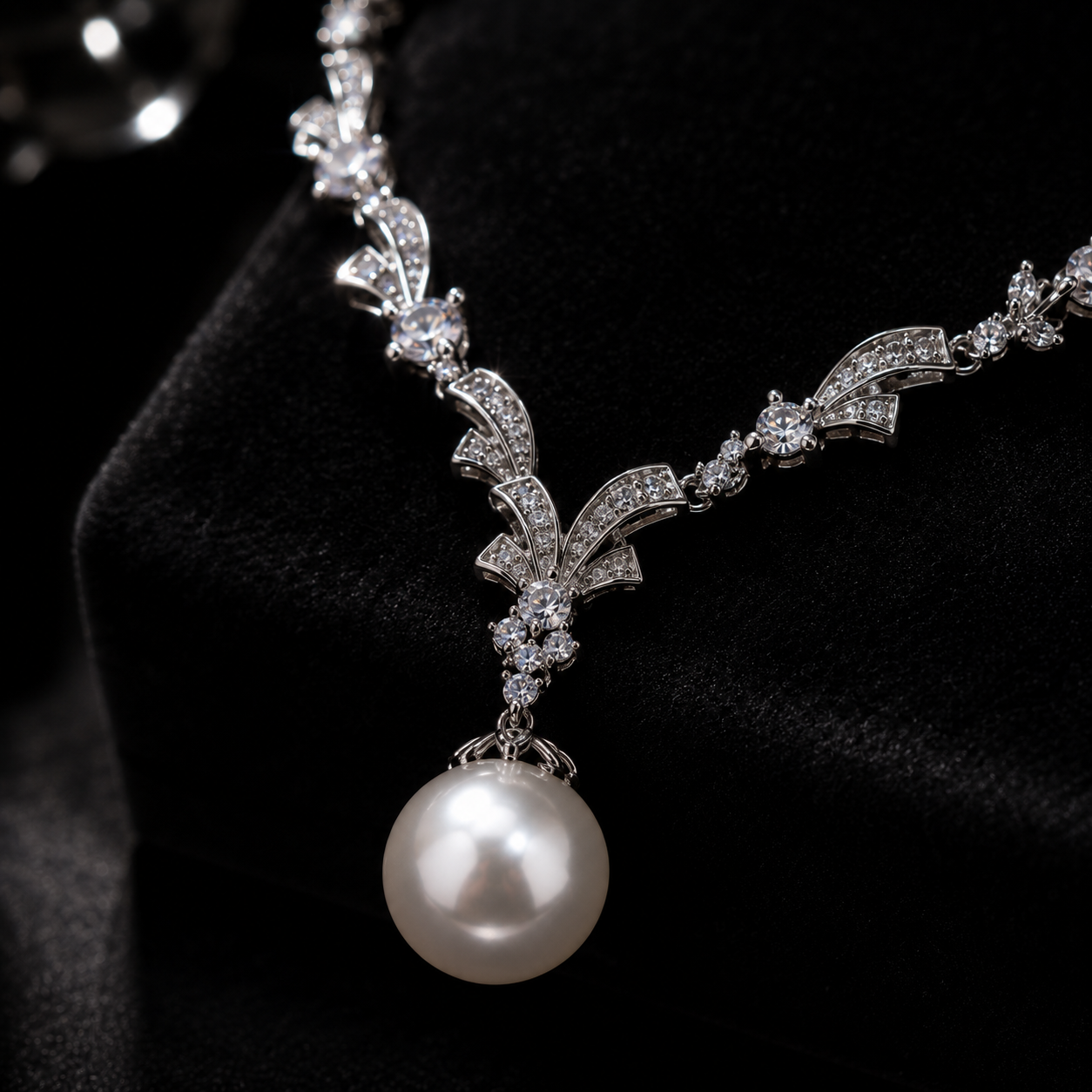 Close up of Aurelia Pearl Pendant Necklace featuring luminous pearl and zircon accents